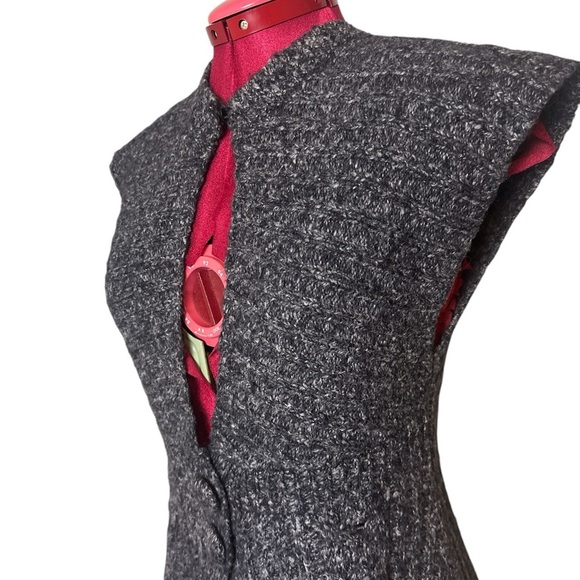 Orb knit sleeveless sweater vest with waist and neck closure cable knit sections - Picture 1 of 7